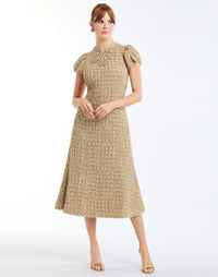 Perla Midi Dress in Gold Multi front – fit-and-flare cocktail midi with puff sleeves, rhinestone bow, crew neckline, and metallic tweed finish by Mestiza New York.