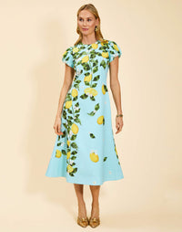 Perla Midi Dress in Sorrento Citrus stretch crepe with puff cap sleeves, crew neckline, and fit-and-flare silhouette.