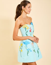 Samar Mini Dress in Blue Waltz moire with removable bow straps, floral embroidery, sweetheart neckline, and bell-shaped silhouette.