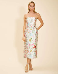 Sabrina Midi Dress in Ivory Floral poly silk twill with strapless straight neckline, pegged column silhouette, and side pockets.