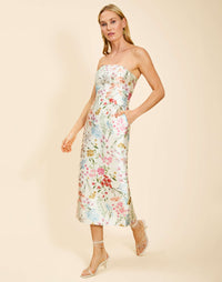 Sabrina Midi Dress in Ivory Floral poly silk twill with strapless straight neckline, pegged column silhouette, and side pockets.