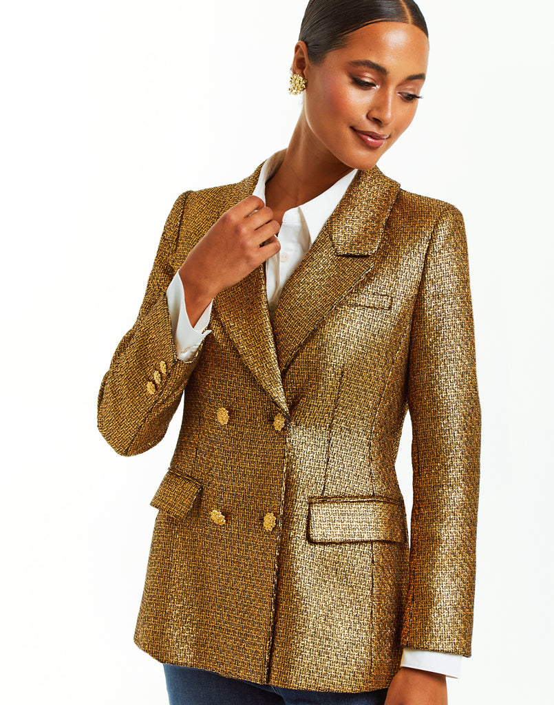 Double breasted metallic tweed blazer, fully lined and with pockets.