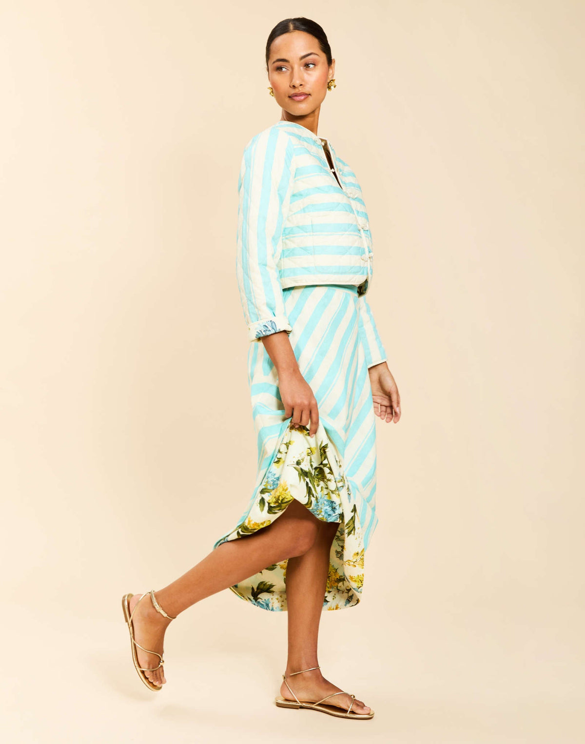 Santiago Convertible Midi Skirt in Aegean Blooms linen featuring reversible stripe and floral prints, bias-cut fabric, and subtle A-line silhouette.
