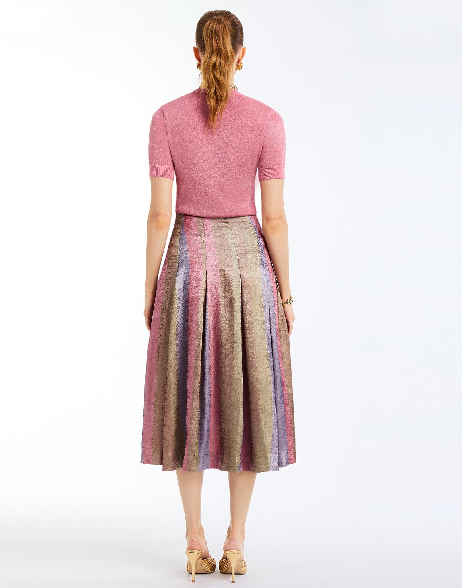 Seville Midi Skirt in Disco Stripes back – high-waisted midi skirt in striped metallic lamé with box pleats and concealed side zipper by Mestiza New York.