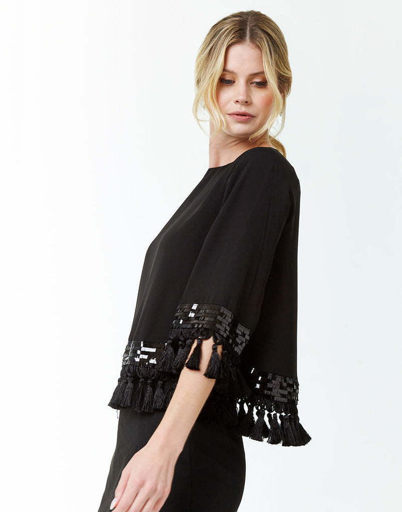 A-line sleeved top crafted in chiffon with tassels and sequin embellishments