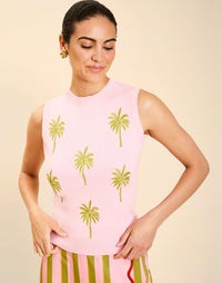 Woman wearing the Mestiza Soho Knit Shell Top in English Rose, featuring a sleeveless silhouette, crew neckline, ribbed trim, cropped fit, and soft knit fabrication.