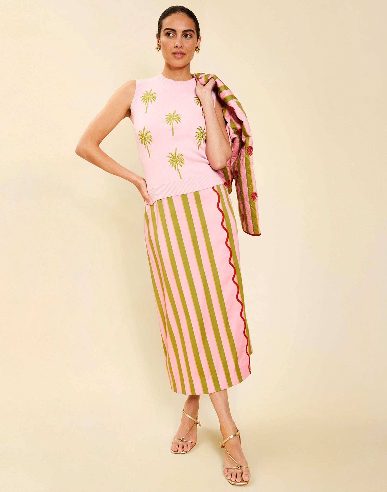 Woman wearing the Mestiza Soho Knit Shell Top in English Rose, featuring a sleeveless silhouette, crew neckline, ribbed trim, cropped fit, and soft knit fabrication.