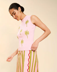 Woman wearing the Mestiza Soho Knit Shell Top in English Rose, featuring a sleeveless silhouette, crew neckline, ribbed trim, cropped fit, and soft knit fabrication.