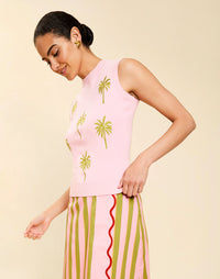 Woman wearing the Mestiza Soho Knit Shell Top in English Rose, featuring a sleeveless silhouette, crew neckline, ribbed trim, cropped fit, and soft knit fabrication.
