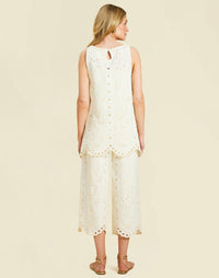Oceane Pant in Ivory broderie anglaise with high waist, cropped wide-leg silhouette, and scalloped hem detail.