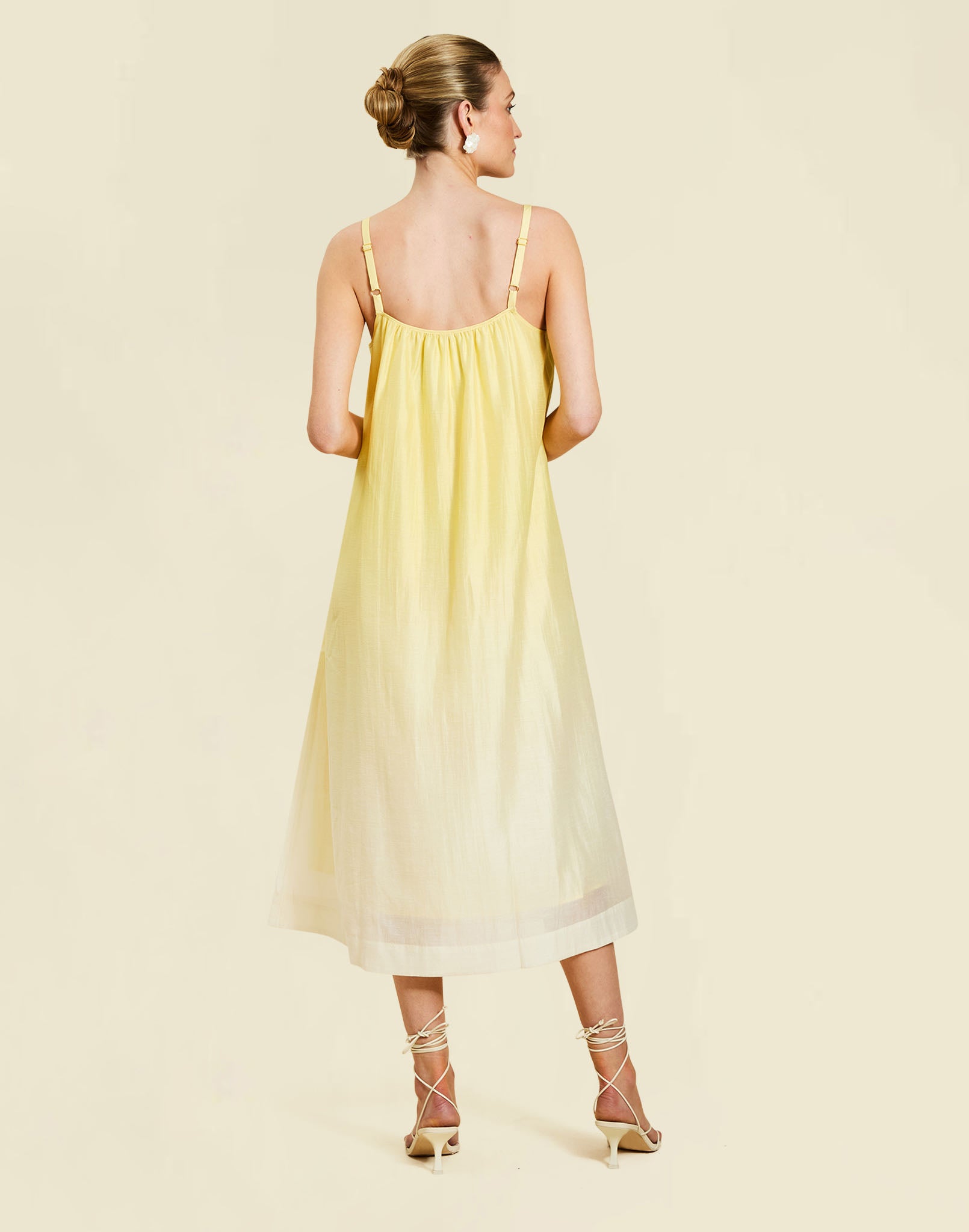 Solenn Midi Dress in Vanilla Sunrise linen organza with 3D shell details, straight neckline, and relaxed midi silhouette.