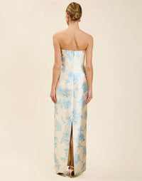 Solstice Gown in Powder Batiste poly silk twill with strapless neckline, removable pleated band, statement bow detail, and fitted gown silhouette.
