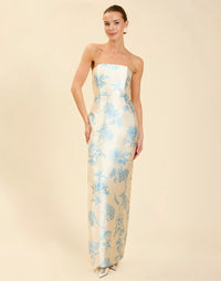 Solstice Gown in Powder Batiste poly silk twill with strapless neckline, removable pleated band, statement bow detail, and fitted gown silhouette.