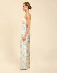 Solstice Gown in Powder Batiste poly silk twill with strapless neckline, removable pleated band, statement bow detail, and fitted gown silhouette.