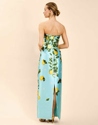 Solstice Gown in Sorrento Citrus poly silk twill with strapless neckline, removable bow, convertible bodice, and side pockets.