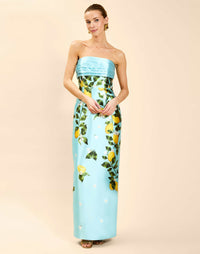 Solstice Gown in Sorrento Citrus poly silk twill with strapless neckline, removable bow, convertible bodice, and side pockets.