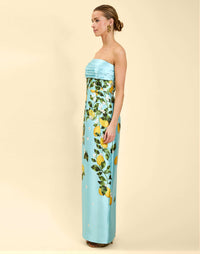 Solstice Gown in Sorrento Citrus poly silk twill with strapless neckline, removable bow, convertible bodice, and side pockets.