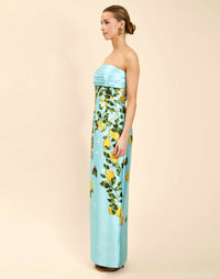 Solstice Gown in Sorrento Citrus poly silk twill with strapless neckline, removable bow, convertible bodice, and side pockets.