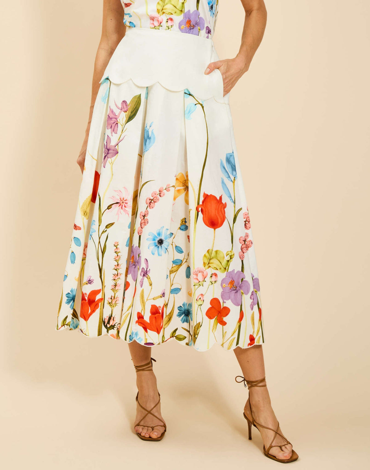 Sonata Scallop Midi Skirt in Garden Muse cotton poplin with embroidered scalloped hem, drop-waist yoke, and side pockets.