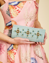 Peridot Beaded Clutch in Aqua Gold with gemstone detailing, intricate beadwork, and structured evening silhouette.