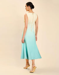 Woman wearing the Mestiza Sunnyside Convertible Midi Dress in Tuscan Daydreaming print, featuring a convertible neckline, fitted bodice, fit-and-flare skirt, and lightweight stretch crepe fabrication.