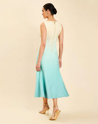 Woman wearing the Mestiza Sunnyside Convertible Midi Dress in Tuscan Daydreaming print, featuring a convertible neckline, fitted bodice, fit-and-flare skirt, and lightweight stretch crepe fabrication.