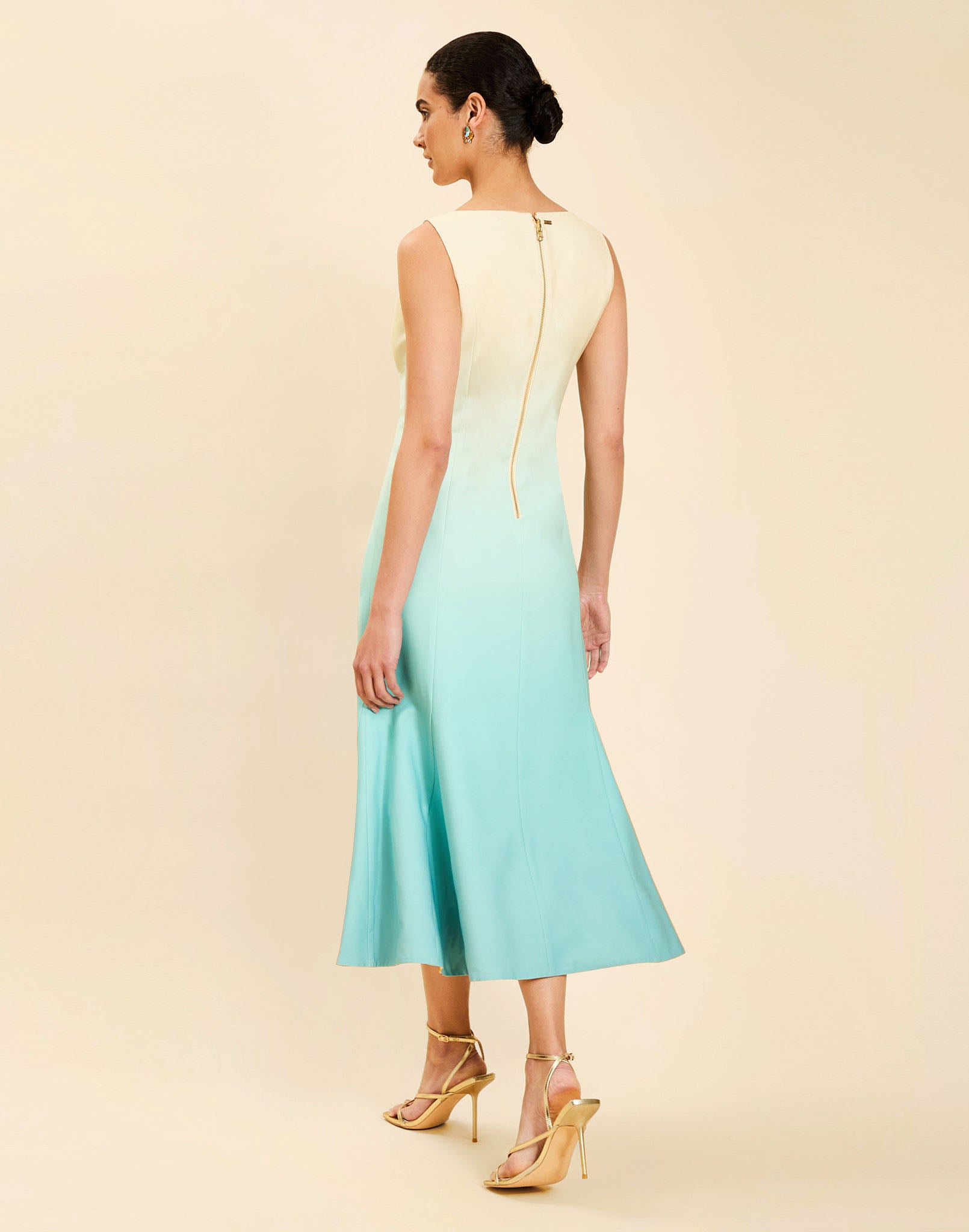 Woman wearing the Mestiza Sunnyside Convertible Midi Dress in Tuscan Daydreaming print, featuring a convertible neckline, fitted bodice, fit-and-flare skirt, and lightweight stretch crepe fabrication.