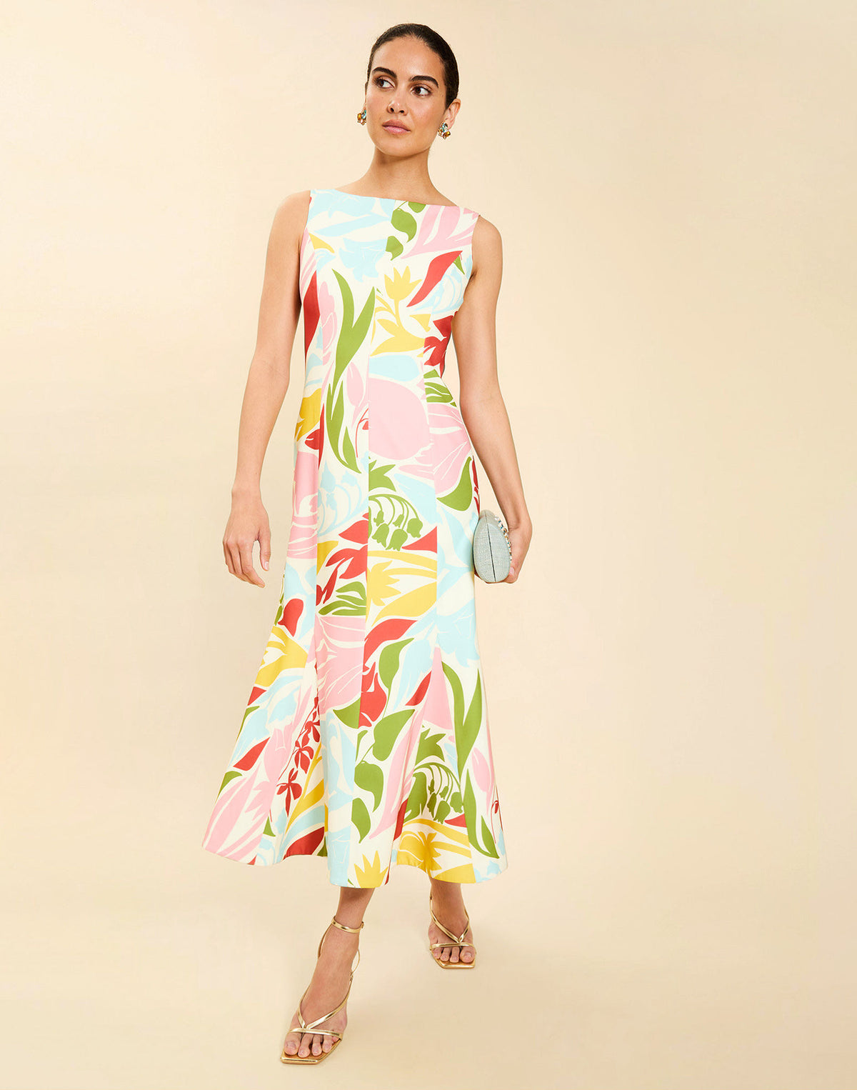 Woman wearing the Mestiza Sunnyside Convertible Midi Dress in Tuscan Daydreaming print, featuring a convertible neckline, fitted bodice, fit-and-flare skirt, and lightweight stretch crepe fabrication.
