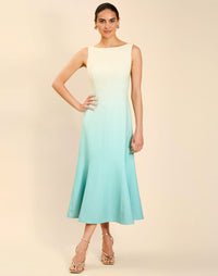 Woman wearing the Mestiza Sunnyside Convertible Midi Dress in Tuscan Daydreaming print, featuring a convertible neckline, fitted bodice, fit-and-flare skirt, and lightweight stretch crepe fabrication.