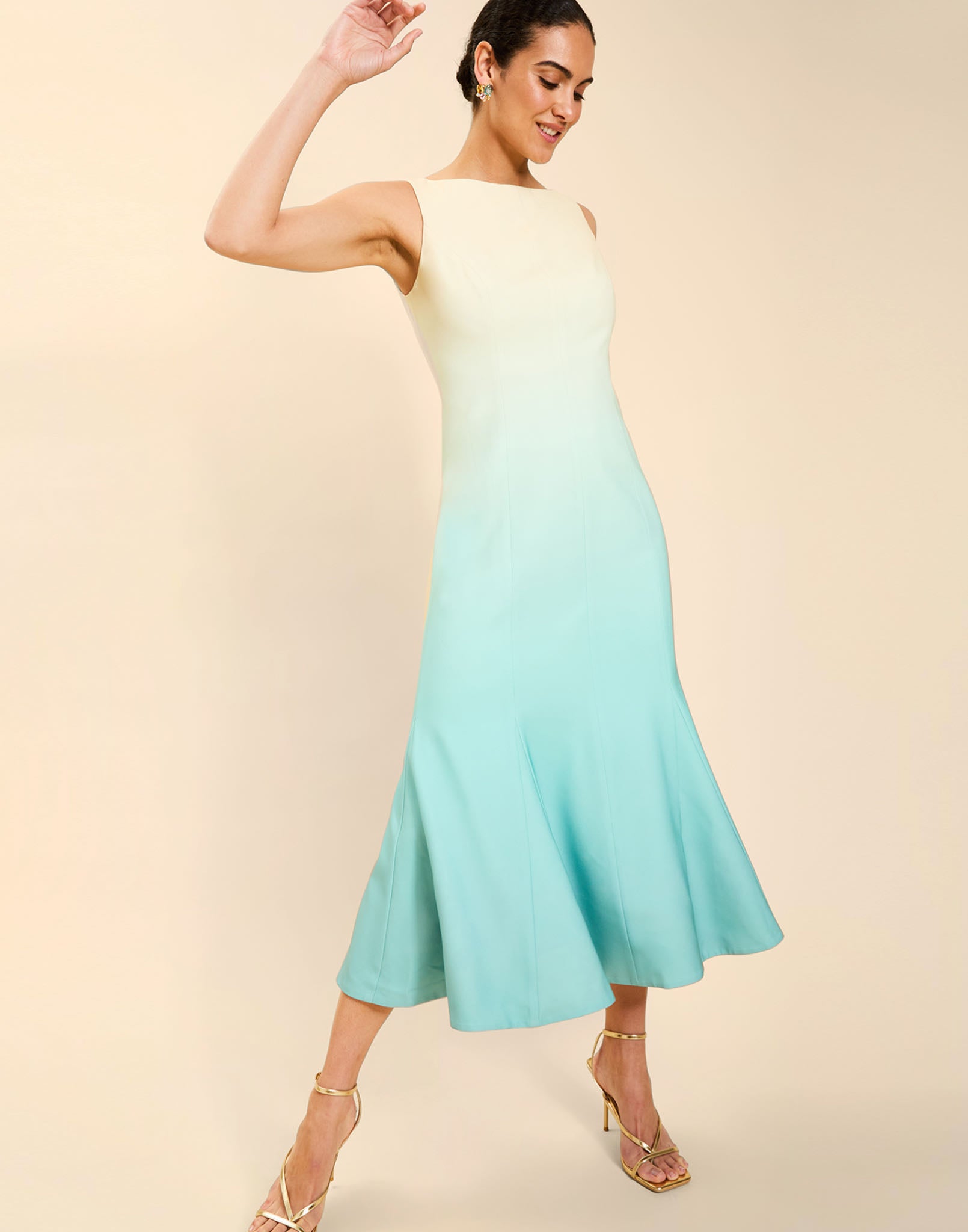 Woman wearing the Mestiza Sunnyside Convertible Midi Dress in Tuscan Daydreaming print, featuring a convertible neckline, fitted bodice, fit-and-flare skirt, and lightweight stretch crepe fabrication.