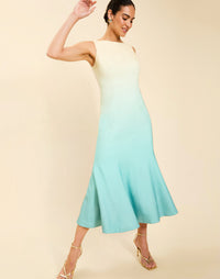 Woman wearing the Mestiza Sunnyside Convertible Midi Dress in Tuscan Daydreaming print, featuring a convertible neckline, fitted bodice, fit-and-flare skirt, and lightweight stretch crepe fabrication.