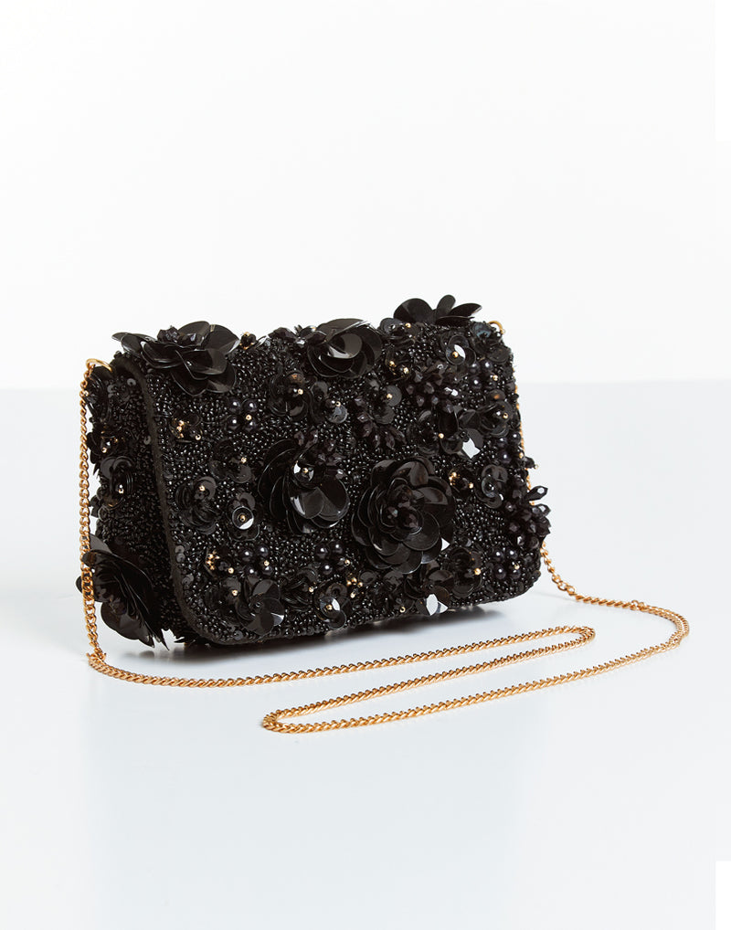  black clutch with beaded florets and gold cross body chain  