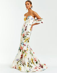 Floral print evening gown with sweetheart neckline and inspired by traditional Terno sleeve style