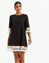 A-line, flowy with sleeves dress with tassel and sequin embellishments